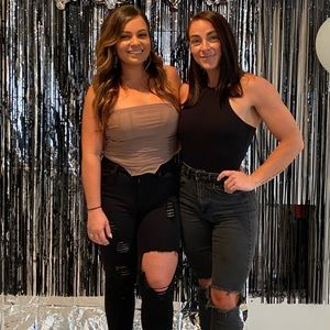 Brown zips up tub top, wore once.